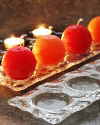 Tento skleněný adventní svícen je elegantním doplňkem pro vánoční období. Vyrobený z čirého skla, svícen pro čtyři svíčky,...